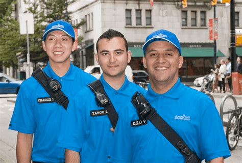 Three people smiling for a picture